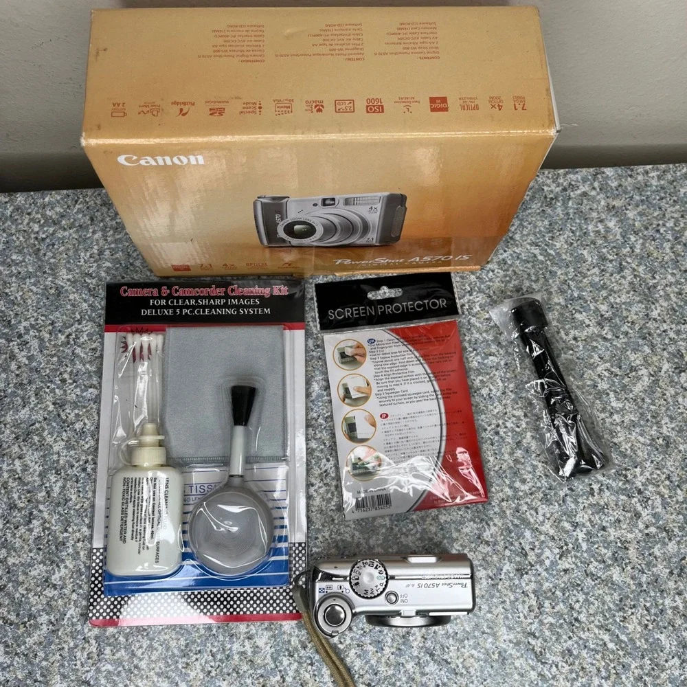 Canon PowerShot A570 IS Digital Camera 7.1MP Silver 4x Zoom Bundle Boxed Tested